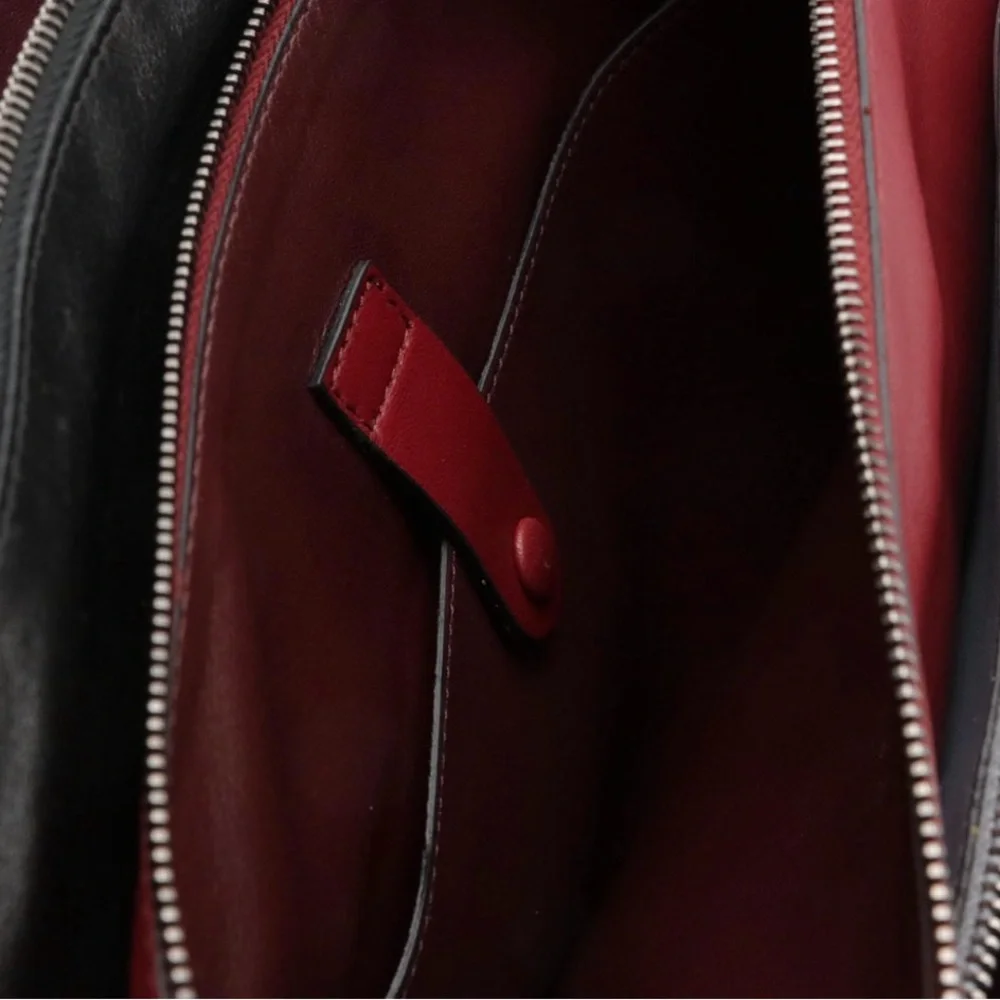 Valentino Garavani Rockstud Triple Zip Clutch in Calfskin Leather Red/Blk/Blu/Wh